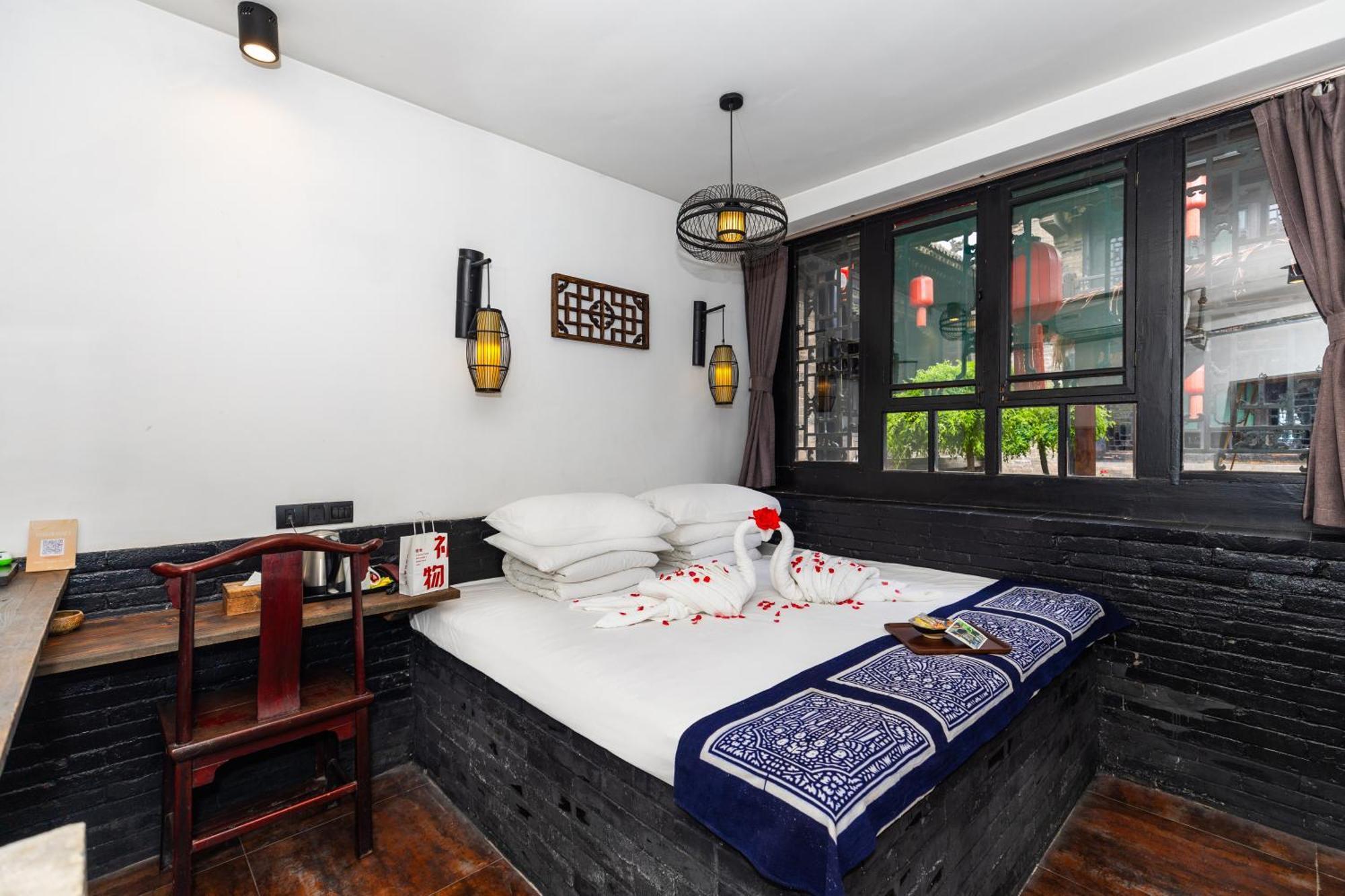 Elsewhere Hotel The Former Residence Of The Draft Bank Pingyao Exteriör bild