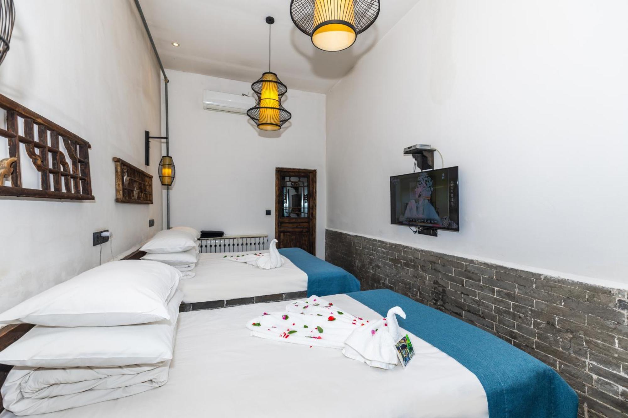 Elsewhere Hotel The Former Residence Of The Draft Bank Pingyao Exteriör bild